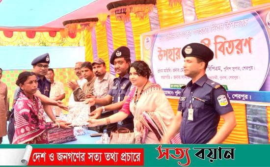 জগৎপুরে শহীদ পরিবারের সদস্যদের মাঝে পুনাক’র উপহার সামগ্রী বিতরন